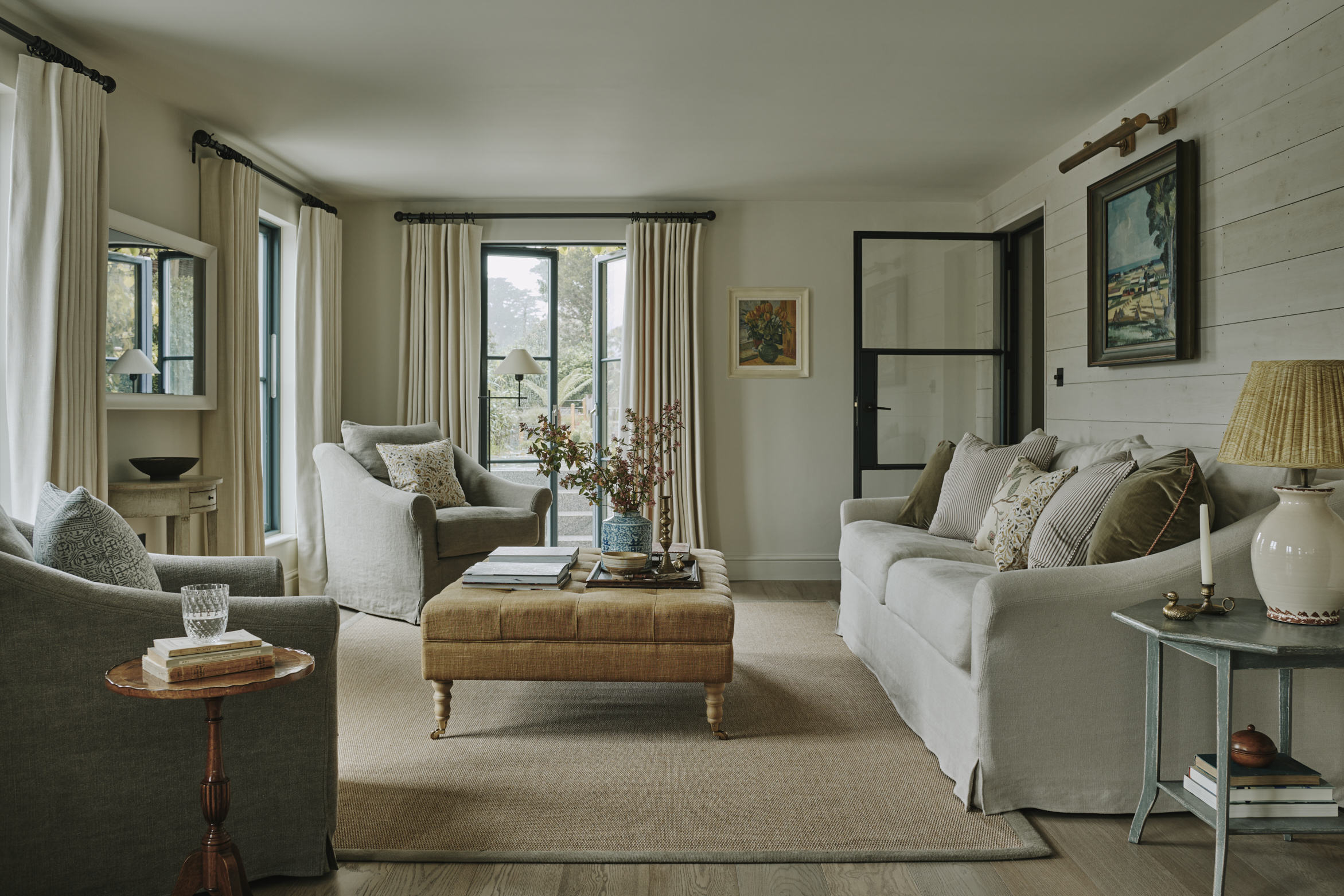 Comfortable sitting room with sofas and artwork