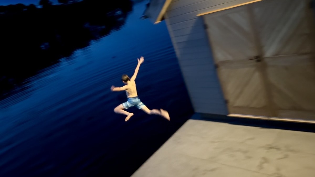 Jumping into the creek from the Boatshed
